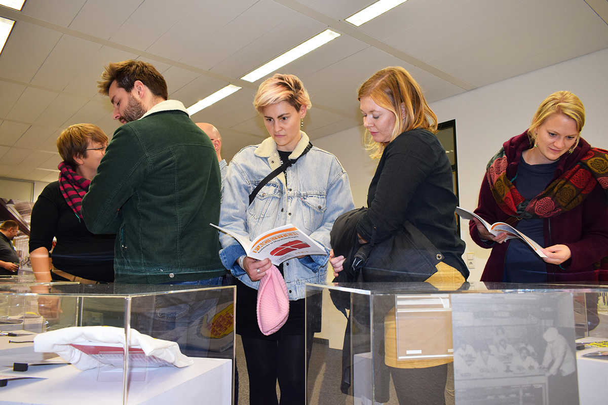 Visitors to the DOMiD exhibition "Facetten" during the Museum Night Cologne 2019.